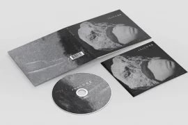 Das Foto zeigt die CD und die Hülle des Albums "Songs of a lost world" von The Cure.