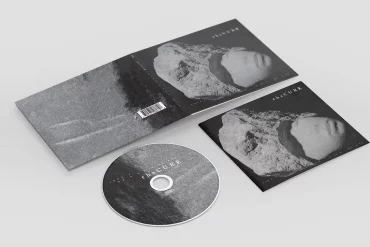 Das Foto zeigt die CD und die Hülle des Albums "Songs of a lost world" von The Cure.